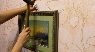 Повесить картину